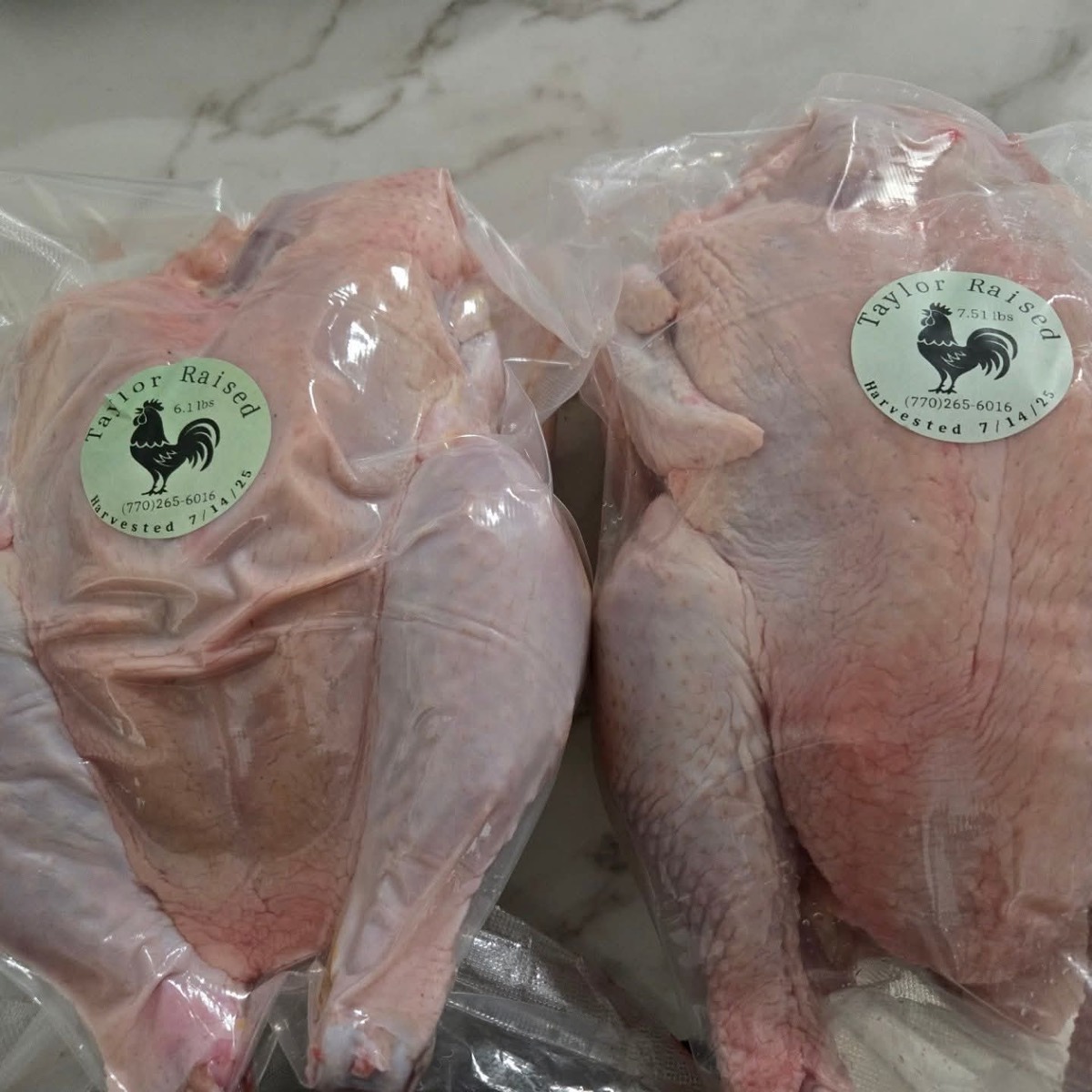 Vacuum-sealed pasture-raised whole chickens with Taylor Raised label